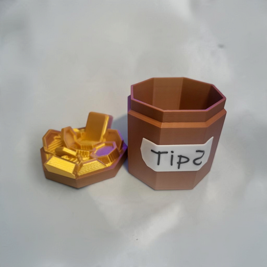 Bone and copper 3D printed tip jar with a fitted lid decorated with gold bar details, shown against a light background.
