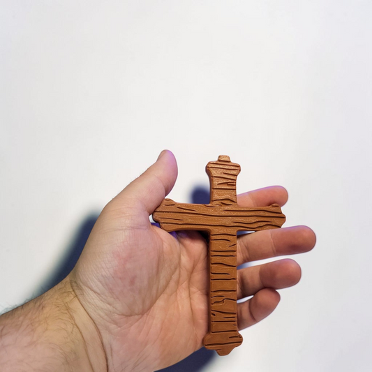 Brown 130 mm 3D printed Doors-inspired crucifix held in a hand, with a textured wood-like finish.