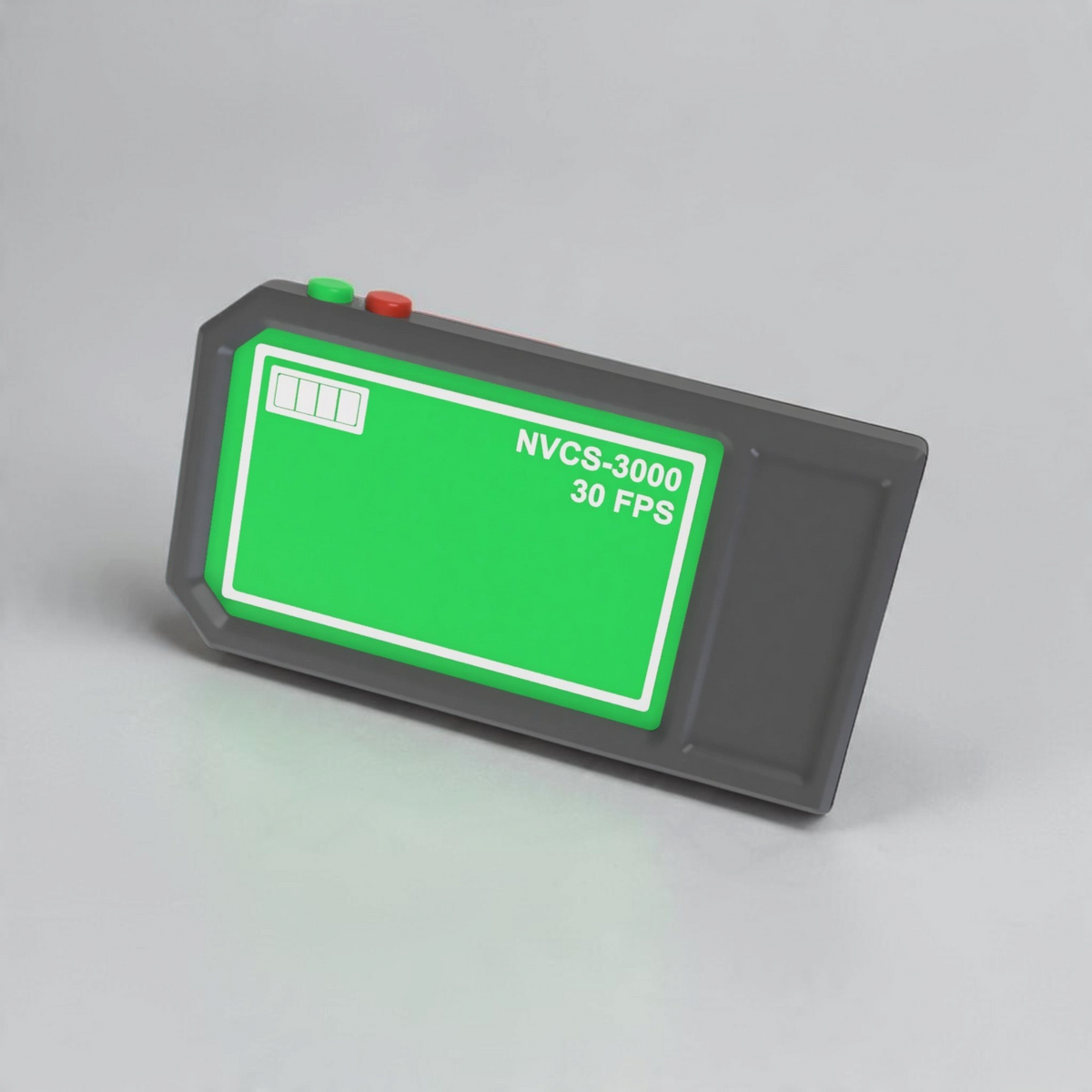 Gray NVCS 3000 handheld prop with bright green screen and red and green buttons, resting on a tabletop at an angle.
