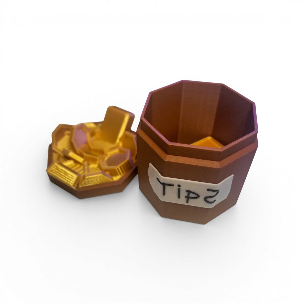 Bone and copper octagonal 3D printed tip jar with a handwritten Tips label and gold coin accessory, isolated on a clean white background.
