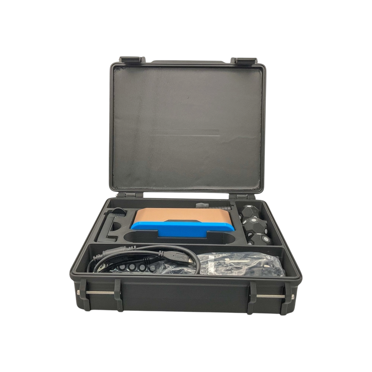 Open black protective case with custom foam compartments for Inspire 2 scanner accessories and cables.